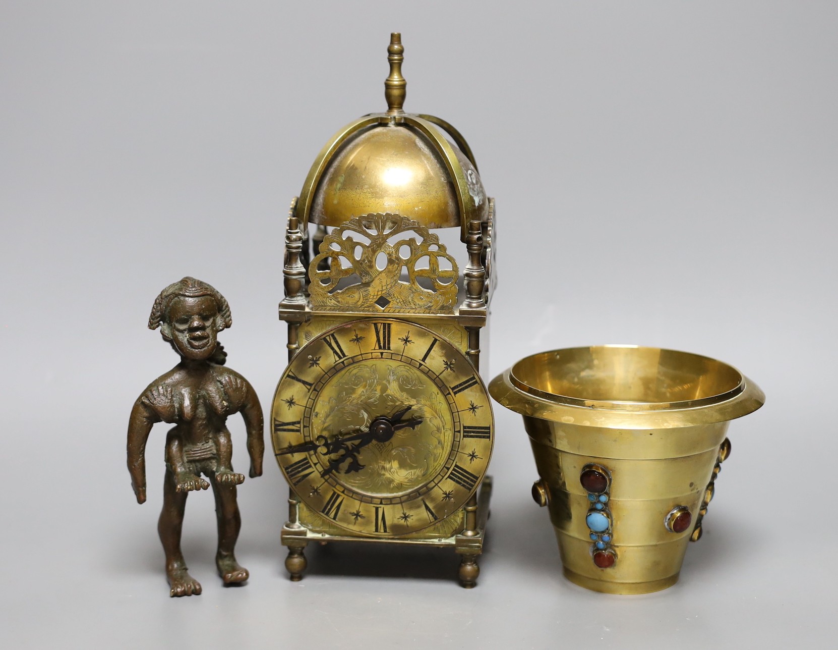 A cabochon-set pail, a 20th century lantern clock and an African cast metal figure